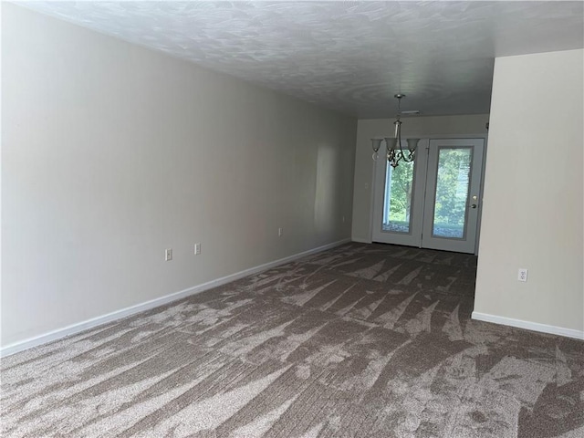 1523 Timothy Dr, Derry Twp, PA 15650 - spare room with carpet floors and a chandelier