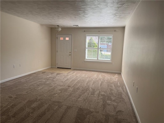 1523 Timothy Dr, Derry Twp, PA 15650 - unfurnished room featuring light carpet and a textured ceiling