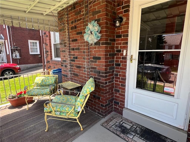 1104 Jefferson St, Mckeesport, PA 15132 - doorway to property featuring brick siding