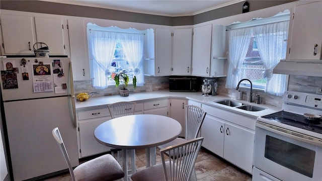 539 Milliken Ave, Sharpsville, PA 16150 - kitchen with white appliances, range hood, tasteful backsplash, light countertops, and crown molding
