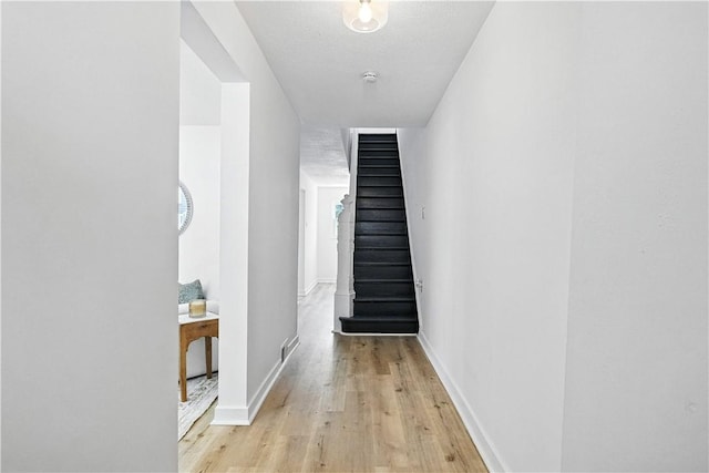 1233 High St, Spring Garden, PA 15212 - corridor with light wood finished floors and stairway