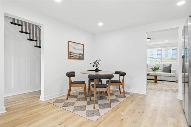 1233 High St, Spring Garden, PA 15212 - dining area featuring wood finished floors, stairs, and recessed lighting