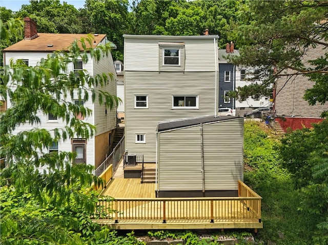 1233 High St, Spring Garden, PA 15212 - back of property with a wooden deck and a chimney