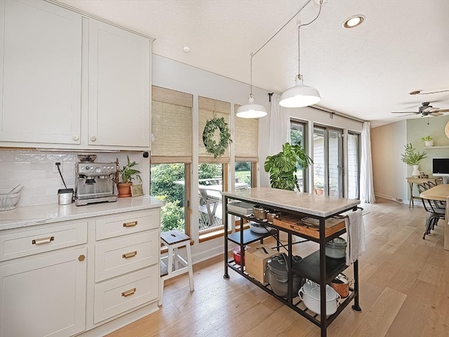 554 Rolling Green Dr, Bethel Park, PA 15102 - dining area with plenty of natural light, light wood-style flooring, a ceiling fan, a textured ceiling, and recessed lighting