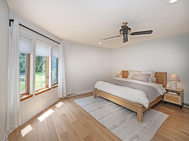 554 Rolling Green Dr, Bethel Park, PA 15102 - bedroom with wood finished floors, recessed lighting, and ceiling fan