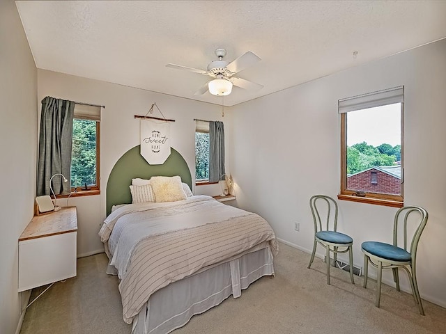 554 Rolling Green Dr, Bethel Park, PA 15102 - carpeted bedroom with ceiling fan and baseboards