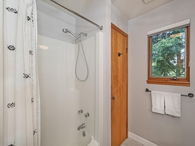 554 Rolling Green Dr, Bethel Park, PA 15102 - bathroom with shower / tub combo with curtain and baseboards