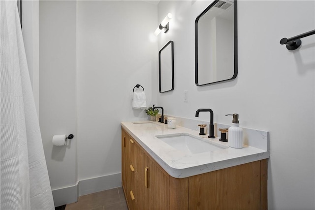 3246 Piedmont Ave, Dormont, PA 15216 - full bath featuring double vanity and tile patterned floors