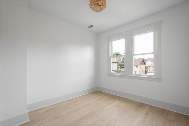 3246 Piedmont Ave, Dormont, PA 15216 - spare room with light wood finished floors and baseboards