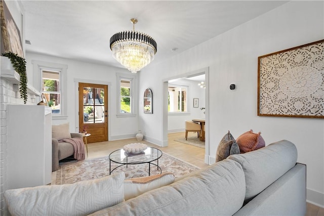 3246 Piedmont Ave, Dormont, PA 15216 - living room featuring healthy amount of natural light and a chandelier