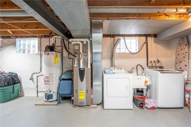 205 Eleanor Dr, Latrobe, PA 15650 - below grade area featuring water heater, separate washer and dryer, and heating unit
