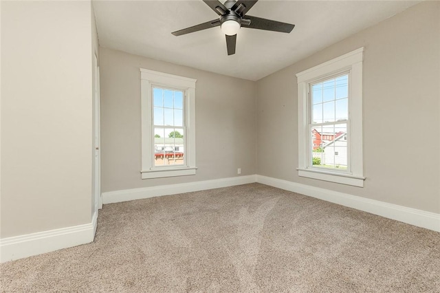413 Spring St, Grove City Boro, PA 16127 - carpeted empty room featuring plenty of natural light and a ceiling fan