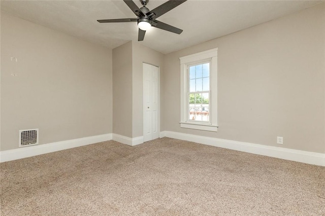413 Spring St, Grove City Boro, PA 16127 - empty room with carpet and a ceiling fan