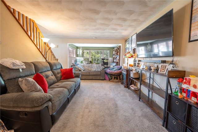 318 Links Ct, Salem Twp Wml, PA 15626 - carpeted living area featuring stairs