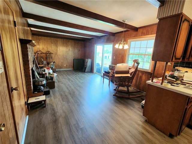 1426 S Darby Rd, Hermitage, PA 16148 - dining space with beam ceiling, wood walls, wood finished floors, and a chandelier