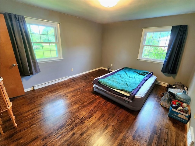 1426 S Darby Rd, Hermitage, PA 16148 - bedroom with a baseboard radiator and wood finished floors