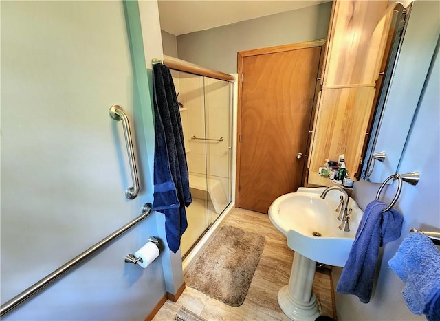 1426 S Darby Rd, Hermitage, PA 16148 - bathroom with a stall shower and wood finished floors