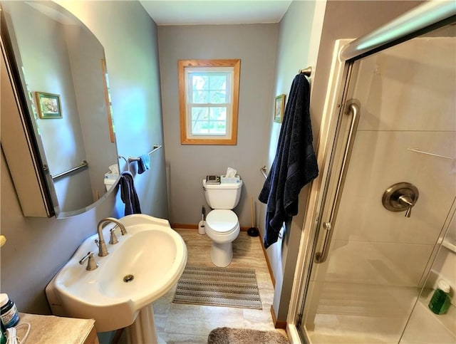 1426 S Darby Rd, Hermitage, PA 16148 - bathroom featuring a stall shower and toilet