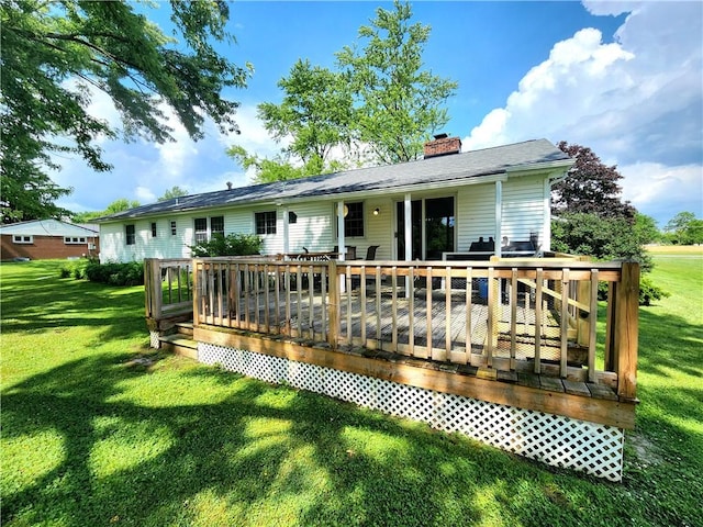 1426 S Darby Rd, Hermitage, PA 16148 - back of property with a chimney, a lawn, and a deck