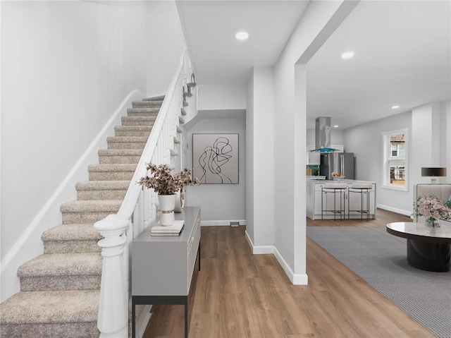 710 7th Ave, New Brighton, PA 15066 - stairs with wood finished floors and recessed lighting