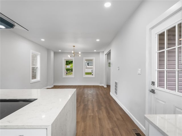 710 7th Ave, New Brighton, PA 15066 - kitchen featuring dark wood-type flooring, recessed lighting, a chandelier, light stone countertops, and open floor plan
