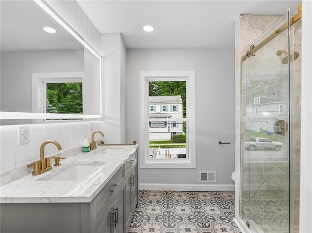 710 7th Ave, New Brighton, PA 15066 - full bathroom featuring double vanity, a stall shower, recessed lighting, and tile patterned flooring