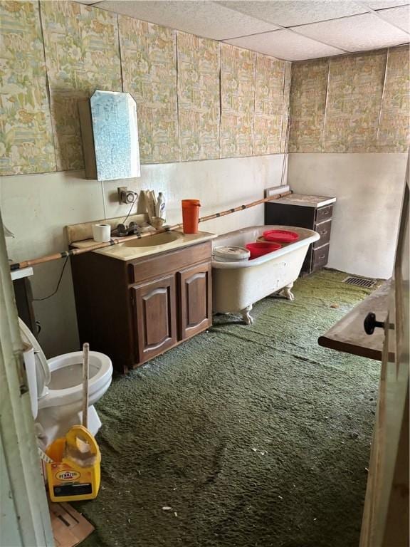 65 Old Mine Rd, Center Twp/Homer Cty, PA 15748 - bathroom with wallpapered walls, vanity, and a paneled ceiling
