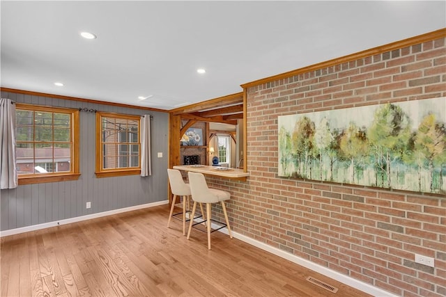 2161/2 Robin Hood Dr, Irwin, PA 15642 - dining room featuring hardwood / wood-style flooring, plenty of natural light, crown molding, recessed lighting, and wood walls
