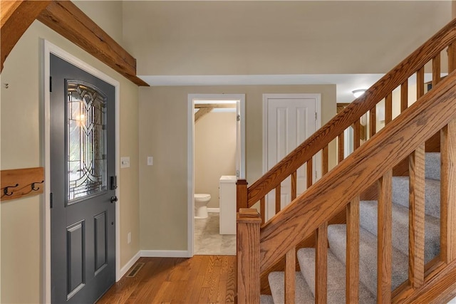 2161/2 Robin Hood Dr, Irwin, PA 15642 - foyer entrance featuring stairway and wood finished floors