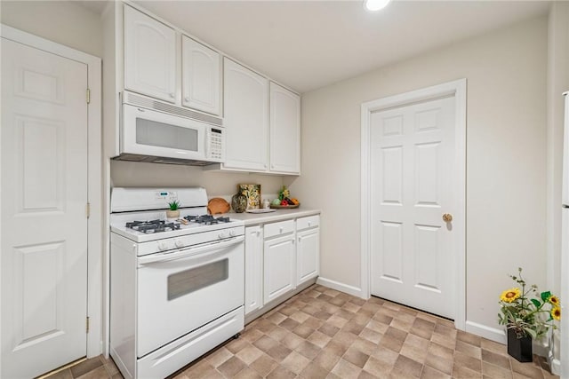 6092 Triple Crown Cir, Hempfield Twp, PA 15601 - kitchen with white appliances, white cabinetry, light countertops, and recessed lighting