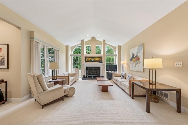 6092 Triple Crown Cir, Hempfield Twp, PA 15601 - carpeted living room featuring lofted ceiling and a fireplace with raised hearth
