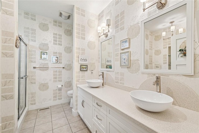 6092 Triple Crown Cir, Hempfield Twp, PA 15601 - full bathroom with a stall shower, double vanity, and tile patterned flooring