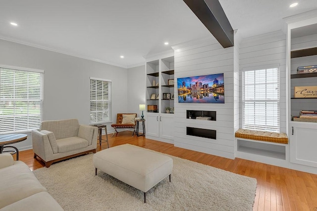 642 Water View Dr, Cranberry Twp, PA 16066 - living room featuring ornamental molding, light wood finished floors, recessed lighting, built in features, and a large fireplace