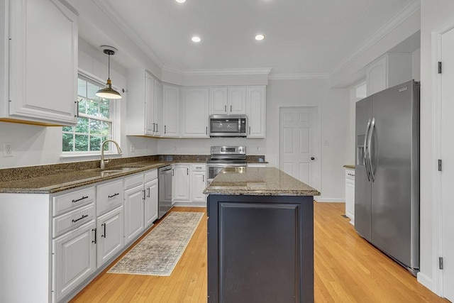 642 Water View Dr, Cranberry Twp, PA 16066 - kitchen featuring appliances with stainless steel finishes, white cabinets, ornamental molding, light wood-type flooring, and recessed lighting