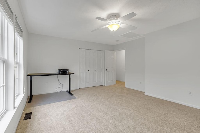 642 Water View Dr, Cranberry Twp, PA 16066 - unfurnished bedroom featuring carpet floors, multiple windows, a closet, and a ceiling fan
