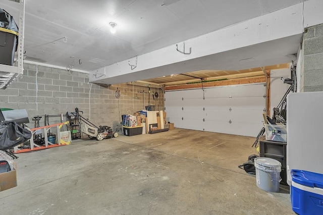 642 Water View Dr, Cranberry Twp, PA 16066 - garage featuring concrete block wall