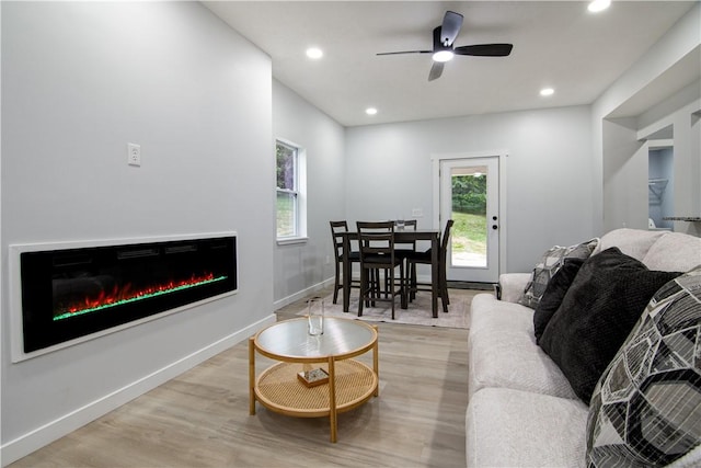 226 Main Street Ext, Callery Boro, PA 16024 - living area with light wood finished floors, healthy amount of natural light, a ceiling fan, a glass covered fireplace, and recessed lighting