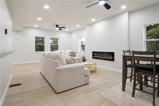 226 Main Street Ext, Callery Boro, PA 16024 - living room featuring a ceiling fan, recessed lighting, plenty of natural light, and light wood-style flooring
