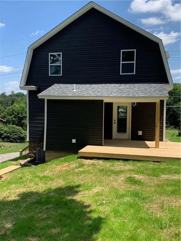 226 Main Street Ext, Callery Boro, PA 16024 - back of house with a gambrel roof, a lawn, and roof with shingles