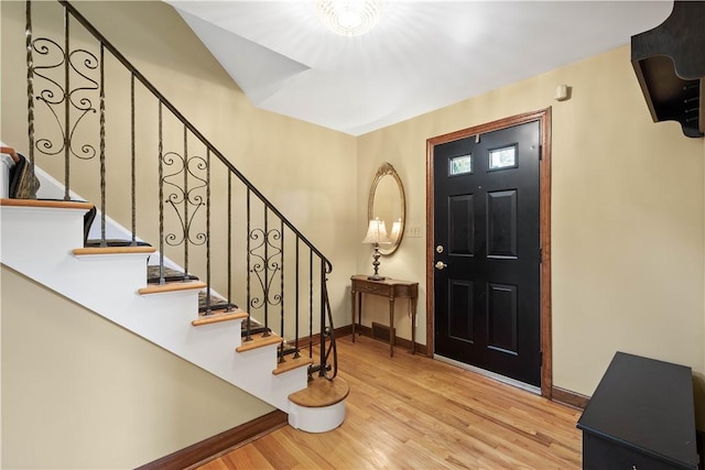 2590 Wildwood Rd, Hampton, PA 15101 - entrance foyer featuring stairs and wood finished floors