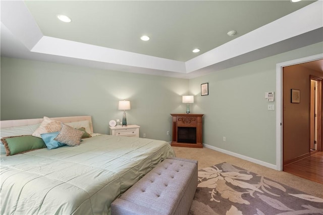 2590 Wildwood Rd, Hampton, PA 15101 - bedroom featuring light colored carpet, a raised ceiling, recessed lighting, and a fireplace