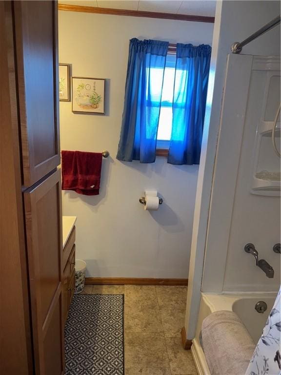 33 Spruce St, Natrona, PA 15065 - full bath featuring vanity, shower / bathtub combination, tile patterned floors, and ornamental molding