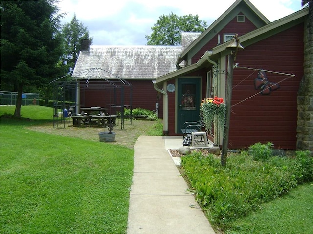 404 Scipio, Jamestown, PA 16134 - entrance to property featuring a lawn and a chimney