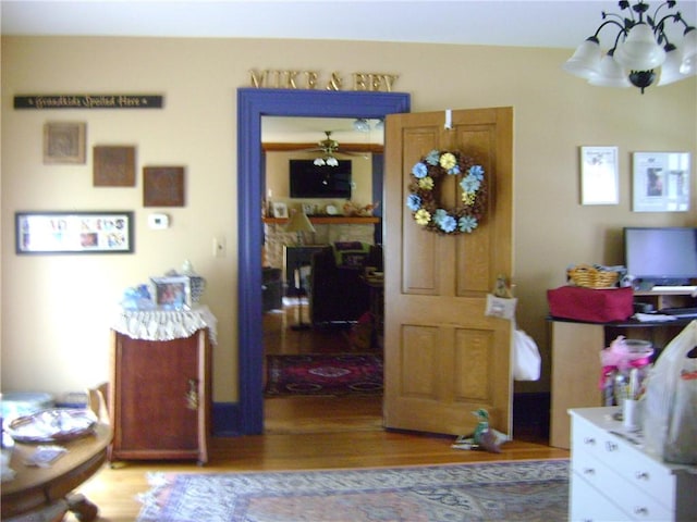 404 Scipio, Jamestown, PA 16134 - living area featuring wood finished floors and a chandelier