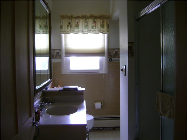 404 Scipio, Jamestown, PA 16134 - full bath with a baseboard radiator, tile walls, a stall shower, vanity, and a wainscoted wall