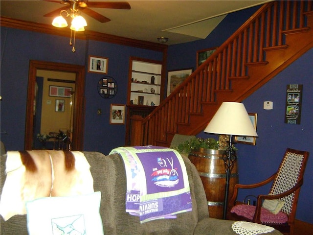 404 Scipio, Jamestown, PA 16134 - living area featuring ceiling fan, stairway, and ornamental molding