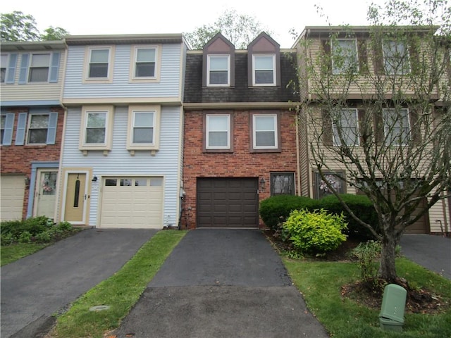 43 Shadow, Whitehall, PA 15227 - multi unit property with driveway, an attached garage, brick siding, and roof with shingles