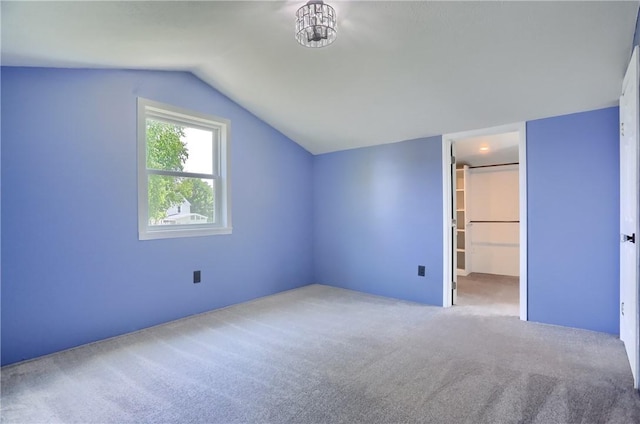 516 5th St, Darlngtn Twp, PA 16115 - additional living space featuring vaulted ceiling and carpet