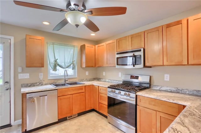 516 5th St, Darlngtn Twp, PA 16115 - kitchen featuring stainless steel appliances, a ceiling fan, light brown cabinetry, and recessed lighting