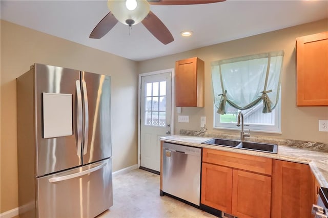 516 5th St, Darlngtn Twp, PA 16115 - kitchen with appliances with stainless steel finishes, a ceiling fan, recessed lighting, and brown cabinetry